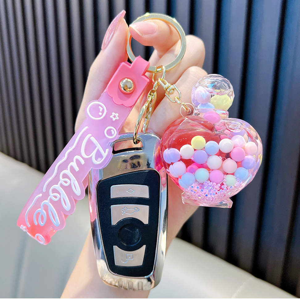 💖 Heart-Shaped Perfume Bottle Keychain