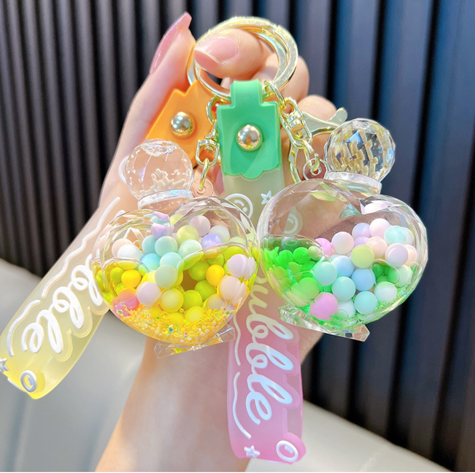 💖 Heart-Shaped Perfume Bottle Keychain