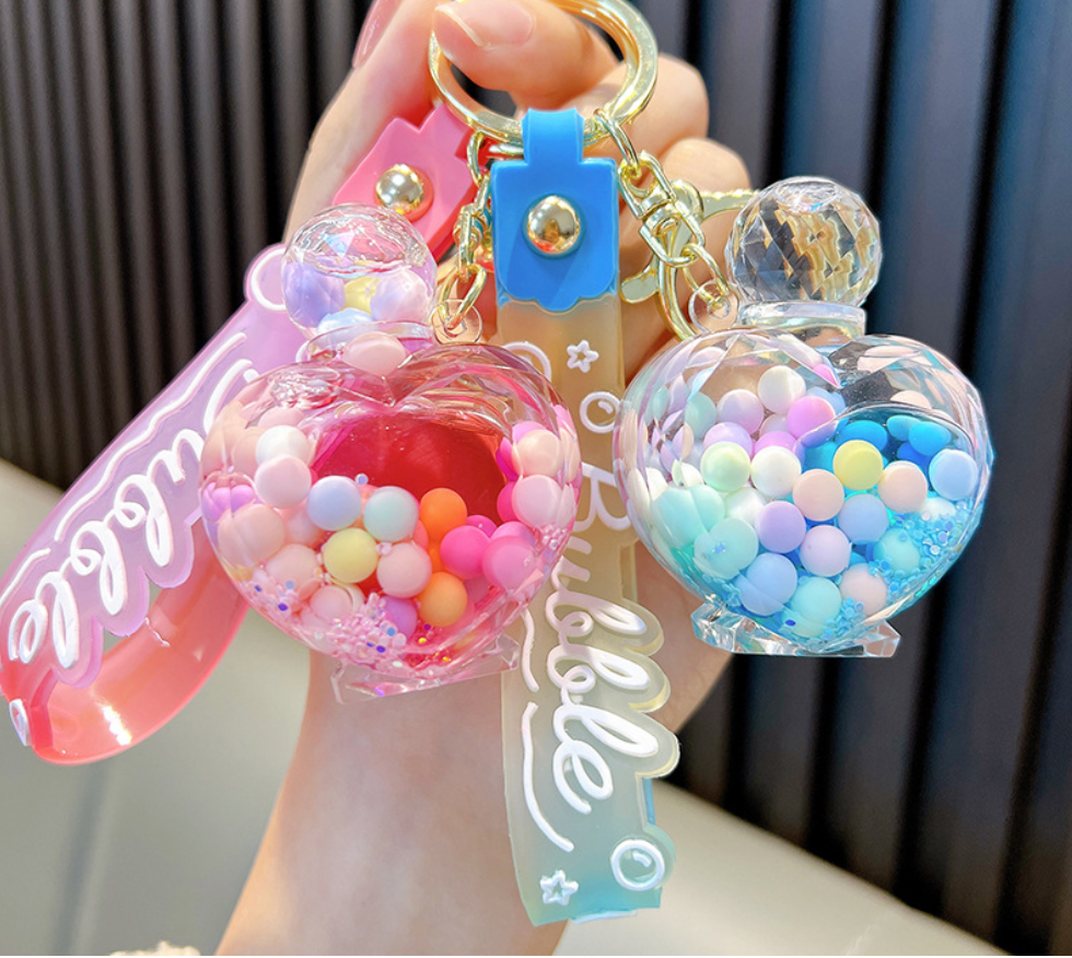💖 Heart-Shaped Perfume Bottle Keychain