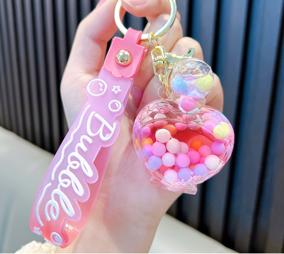 💖 Heart-Shaped Perfume Bottle Keychain