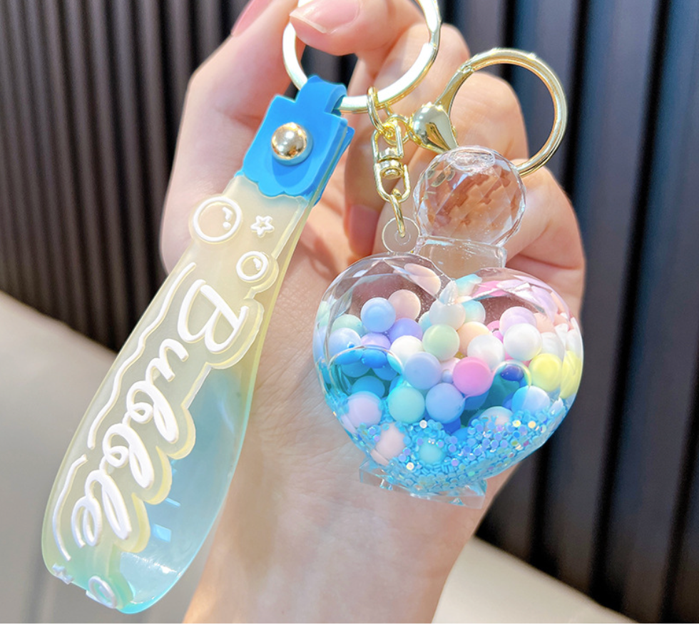 💖 Heart-Shaped Perfume Bottle Keychain