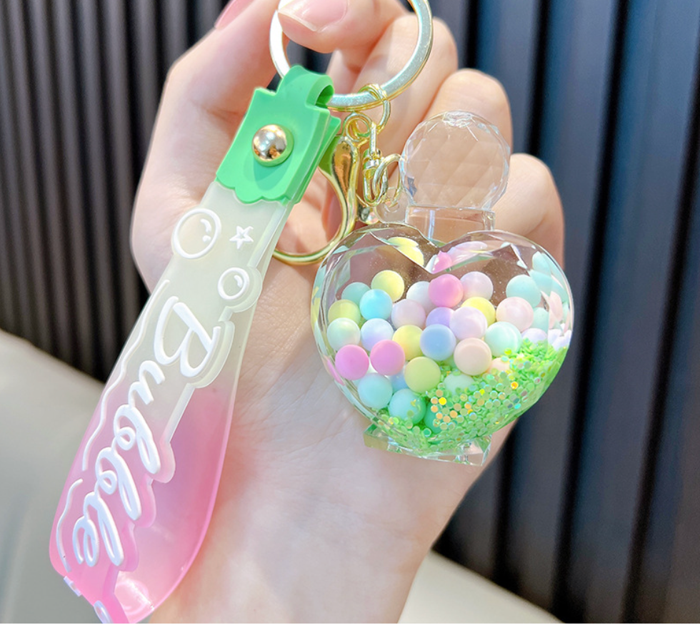💖 Heart-Shaped Perfume Bottle Keychain