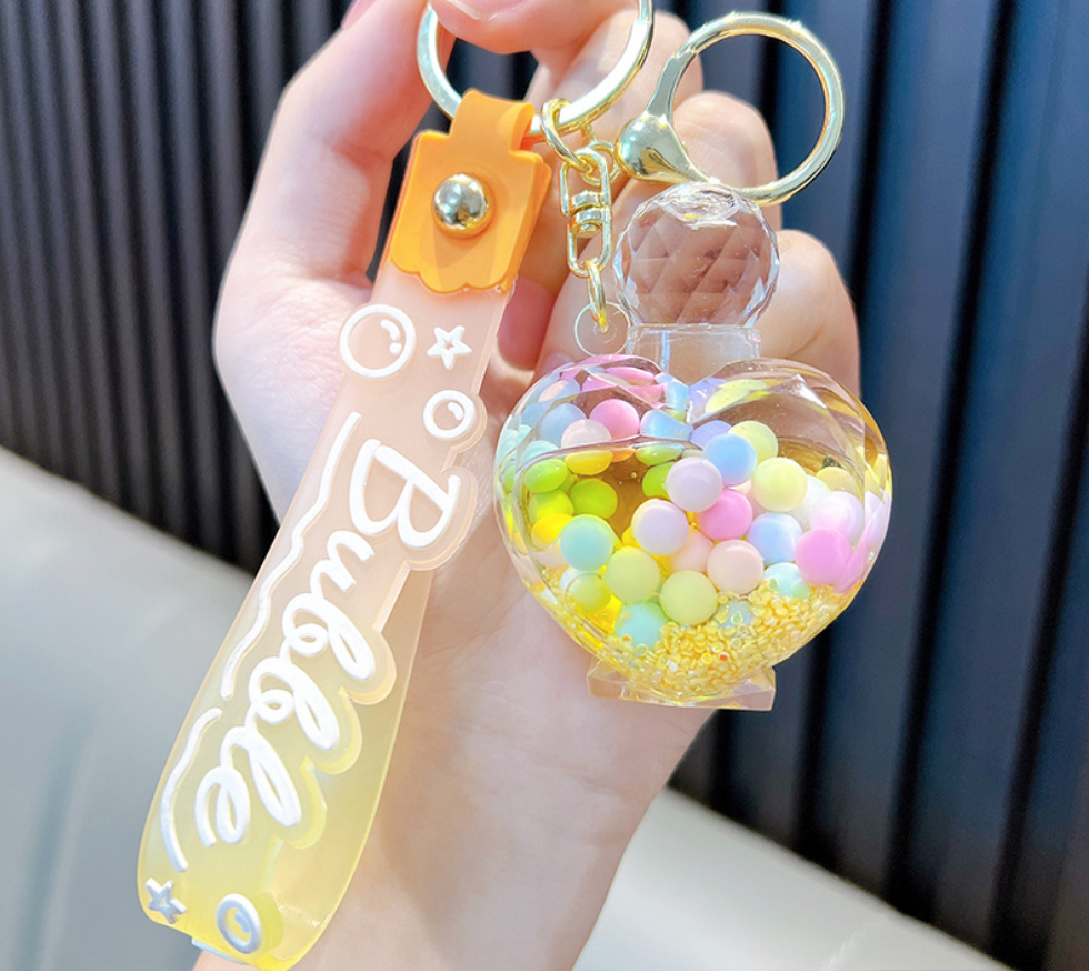 💖 Heart-Shaped Perfume Bottle Keychain