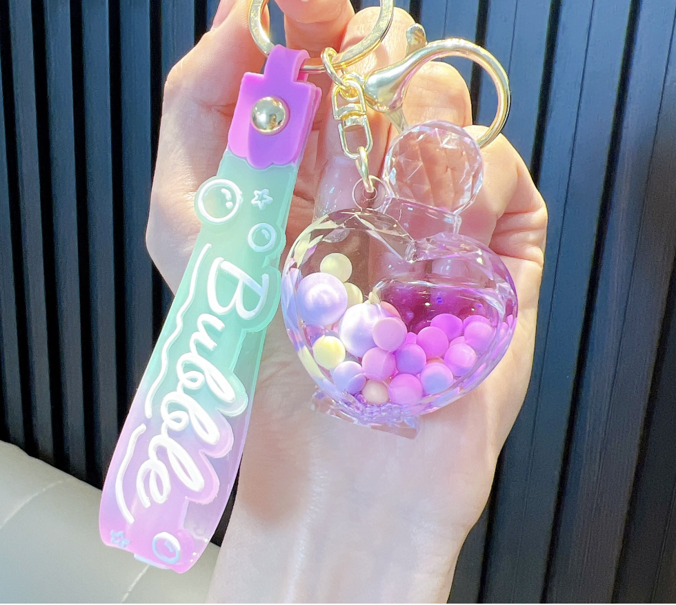💖 Heart-Shaped Perfume Bottle Keychain